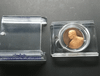 Polished copper commemorative coin of King Rama IX, 43rd anniversary of NIDA, with original case.