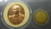 Bronze coin featuring the image of King Rama IX, commemorating the 100th anniversary of Chulalongkorn Hospital, 2014.