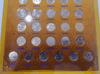 Complete set of circulating 1-baht coins, featuring the Phra Sri Rattana Chedi on the reverse, from the reign of King Rama IX. (Note: the 1986 coin is circulated, while coins from 1987-2017 are uncirculated.)