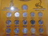 Complete set of circulating 1-baht coins, featuring the Phra Sri Rattana Chedi on the reverse, from the reign of King Rama IX. (Note: the 1986 coin is circulated, while coins from 1987-2017 are uncirculated.)