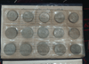 A complete set of 15 1-baht coin albums, green leather cover, from the Royal Thai Mint. Uncirculated (limited production).