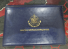 A complete set of 15 1-baht coin albums, green leather cover, from the Royal Thai Mint. Uncirculated (limited production).