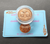 Bronze commemorative coin for the opening of the royal monument, 2000. Size: 2 cm.