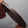 A commemorative coin for Her Majesty Queen Sri Savangavadhana's 90th birthday, made of blackened copper, 7 cm in diameter, minted in 1990 (B.E. 2533), with original box.