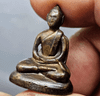 A Phra Kring amulet, handcrafted by Her Majesty Queen Mother Sirikit, from 2515 BE (1972 AD). In beautiful condition, easily verifiable as authentic.