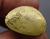 A Phra Kring amulet, handcrafted by Her Majesty Queen Mother Sirikit, made of mixed gold alloy, dated 2515 BE (1972 AD). Beautiful form, easily verifiable as authentic, and rare in material.