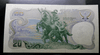 A rare, uncirculated 20-baht banknote, 12-digit serial number, from the reign of King Rama IX, minted in 1981 (B.E. 2524).