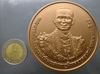 Blackened sandblasted copper coin, size 7 cm., commemorative of the royal cremation ceremony of King Rama IX, with box and certificate.