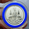 Two-sided commemorative coin with the symbol of the Golden Jubilee, made of 99.9% pure silver, size 3.2 cm., created by Thai Airways in 1996.