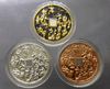 The coin of the Han Dynasty (committee set) 121 years old, 18 Arahants, 100 years old, Wat Bowon 2013, with the original oak frame from the temple.
