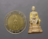 https://asiamintcollections.com/product/statue-of-king-rama-ix-sitting-on-the-throne-made-of-polished-silver-somdej-phra-sangkharat-wat-bowonniwet-vihara-1997/
