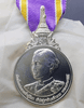 A commemorative medal decorated with a ribbon, in honor of the coronation ceremony of Her Majesty Queen Suthida, 2019, "Male Model"