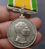 Medallion decorated with ribbon, King Rama IX, commemorative of the 25th anniversary of the accession to the throne, 1971, silver (male style)
