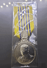 Commemorative coin decorated with a ribbon, Rama IX, on the occasion of the 7th Cycle Birthday Anniversary, 2011 (male model)
