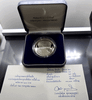 100 baht coin, polished nickel, commemorative of the 33rd World Scout Conference, 1993, with leather box and certificate.
