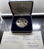 100 baht coin, polished nickel, commemorative of the 33rd World Scout Conference, 1993, with leather box and certificate.