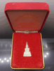 The Emerald Buddha (Phra Kaew Morakot) bell, made of silver, honoring the Chakri Dynasty, Wat Phra Sri Rattana Satsadaram, year 1997.