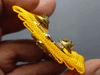 Golden Jubilee pin on yellow silk cloth, created on the occasion of the 75th birthday of King Rama IX in 2002, with original case, guaranteed authentic.