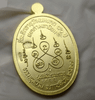 The auspicious coin of Luang Pu Sila Sirichanto (separate committee set, antique gold plated, blue enamel) commemorating the 80th birthday of Dharma Uthayan, Kalasin Province, year 2024.