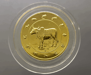 Copper zodiac coin, gold plated, Year of the Ox, 2009, minted by the Royal Thai Mint, uncirculated.
