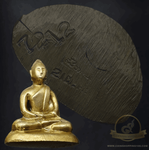 A Phra Kring amulet, handcrafted by Her Majesty Queen Mother Sirikit, made of mixed gold alloy, dated 2515 BE (1972 AD). Beautiful form, easily verifiable as authentic, and rare in material.