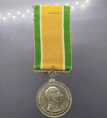 Medallion decorated with ribbon, King Rama IX, commemorative of the 25th anniversary of the accession to the throne, 1971, silver (male style)