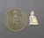 Phra Phuttha Nirantarai amulet, made of silver, commemorating Her Royal Highness Princess Maha Chakri Sirindhorn's birthday on Thai Heritage Conservation Day, Wat Ratchabophit (13 mm high), with original box, B.E. 2541 (1998).