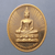 Phra Phuttha Navarat Bophit amulet, with the initials "Bhumibol Adulyadej" (Bhumibol Adulyadej Royal Emblem) on the reverse, made of copper, from Wat Tritotsathep, 2011 (B.E. 2554), with original case.