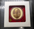 Bronze coin featuring the image of King Rama IX on the front and the Royal Monogram (ภปร) on the back, commemorating the 100th anniversary of Chulalongkorn Hospital, Thai Red Cross Society. Comes with original box.