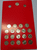 A complete set of 22 uncirculated 1-baht commemorative coins and a 1-baht banknote (King Rama IX), packaged in a red blister pack.