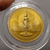 Commemorative bronze coin of King Rama IX, with the image of Phra Siam Thewathirat on the reverse, 1997 (B.E. 2540).