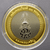 A commemorative coin celebrating the 88th birthday of King Rama IX, made of polished silver with partial plating of real gold, complete with original box and all accessories.