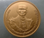 Blackened sandblasted copper coin, size 7 cm., commemorative of the royal cremation ceremony of King Rama IX, with box and certificate.