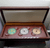 The coin of the Han Dynasty (committee set) 121 years old, 18 Arahants, 100 years old, Wat Bowon 2013, with the original oak frame from the temple.