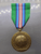 United Nations Peacekeeping Medal in Cambodia (UNTAC) or United Nations Meritorious Service Medal (UN Medal)