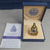Brooch, commemorative pin, celebrating the 60th anniversary of His Majesty's accession to the throne in 2006, made by the Office of the Permanent Secretary to the Prime Minister (OPM), with box and certificate.
