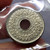 1945 - Thailand 1945 - 10 Satang Tin Coin - Bua Kanok Khaeng Singh Pattern, unused.