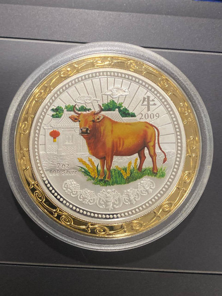 2009 treasures booming ox 2oz colored silver proof coin shape round gold $2