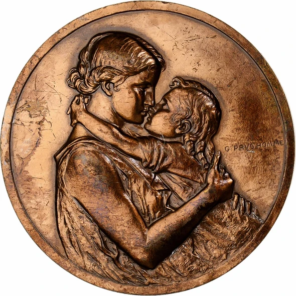 Bronze medal, mother and child, signed G. Prud'Homme