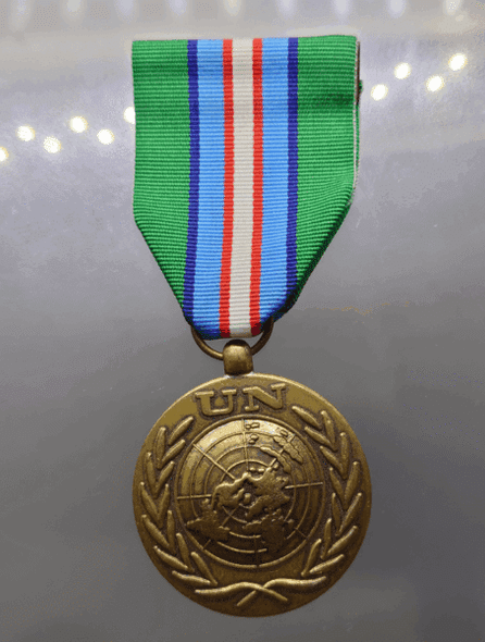 United Nations Peacekeeping Medal in Cambodia (UNTAC) or United Nations Meritorious Service Medal (UN Medal)