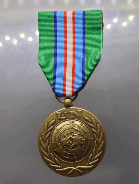 United Nations Peacekeeping Medal in Cambodia (UNTAC) or United Nations Meritorious Service Medal (UN Medal)