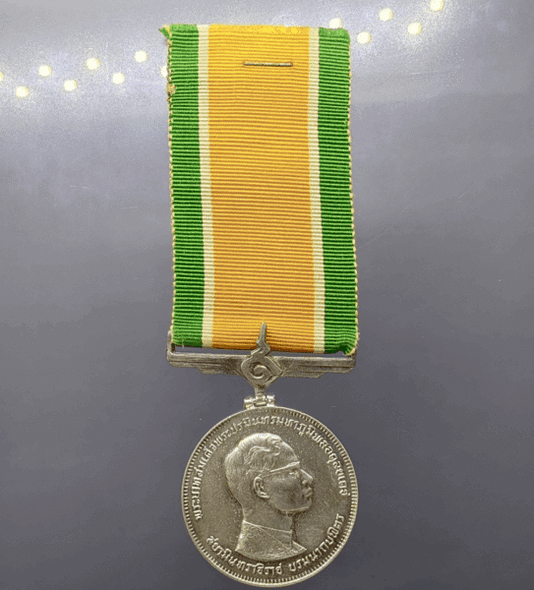 Medallion decorated with ribbon, King Rama IX, commemorative of the 25th anniversary of the accession to the throne, 1971, silver (male style)