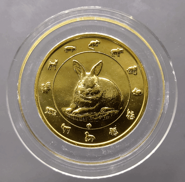 Zodiac coin, copper plated with gold, Year of the Rabbit, 2011, created by the Treasury Department, uncirculated.