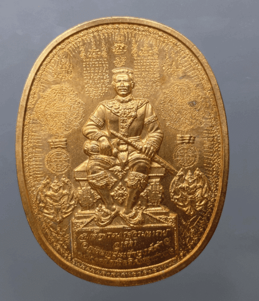 The amulet coin of King Naresuan the Great, "Black", sitting on a large throne, "Defeat the Enemies" model, Ayutthaya Province, year 2006, copper material.