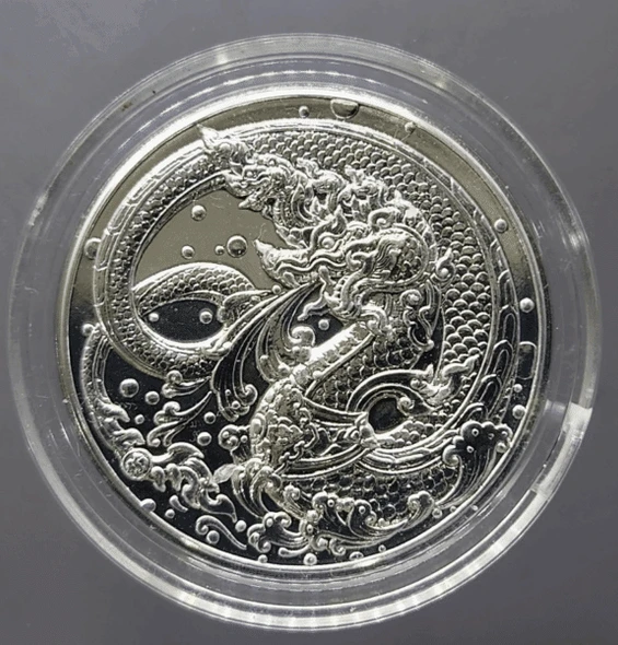 Zodiac coin, copper plated with silver, Year of the Dragon, 2024, created by the Treasury Department, uncirculated.