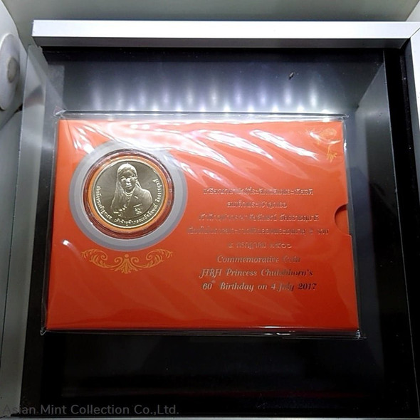 Panel with coins, 50 baht coins commemorating the 5th Cycle Birthday Anniversary of Her Royal Highne