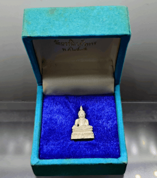Phra Phuttha Chinnasri (Luang Pu Chakri Sirindhorn) amulet, made of silver, 21 mm tall, from Wat Bowonniwet Vihara, 2535 BE (1992 AD), with original box.