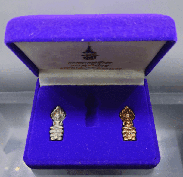 Phra Nak Prok amulet, Royal Emblem (Silver and Nawaloha set), Princess Sirindhorn, Wat Bowonniwet Temple, 2538 BE (1995 AD), with original box.