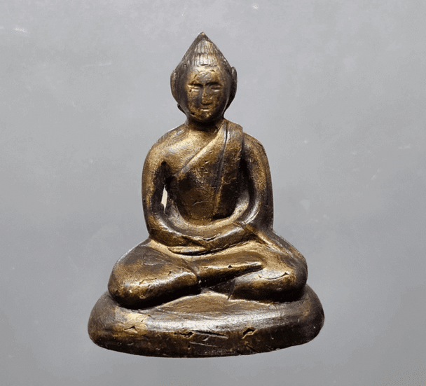 A Phra Kring amulet, handcrafted by Her Majesty Queen Mother Sirikit, from 2515 BE (1972 AD). In beautiful condition, easily verifiable as authentic.
