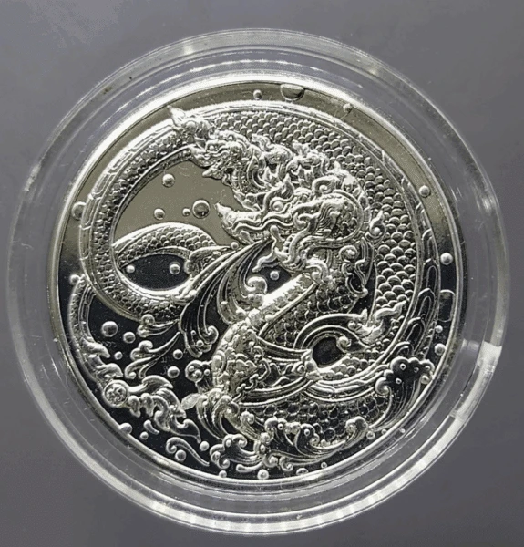 Zodiac coin, copper plated with silver, Year of the Dragon, 2024, created by the Treasury Department, uncirculated.